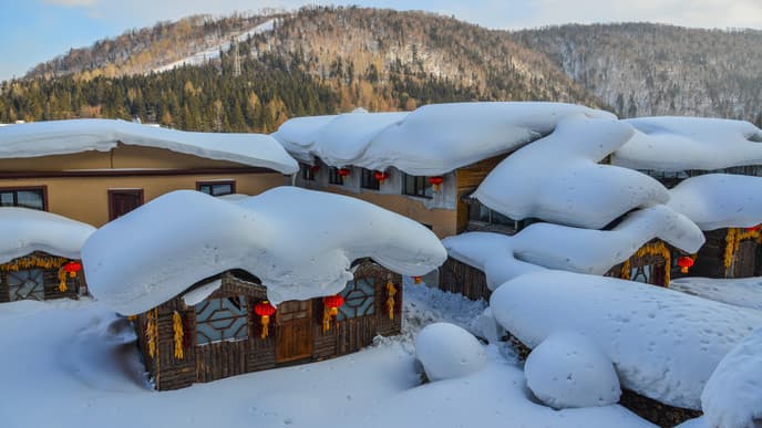 Soak in Hot Spring Pools Surrounded by Snow