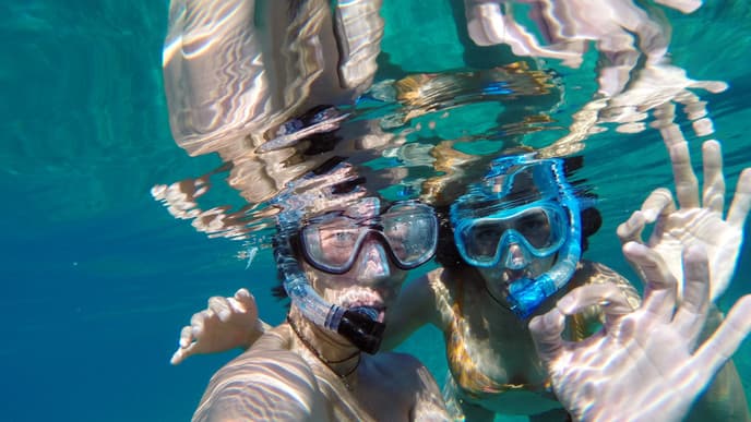 Schnorcheln und Sonnenuntergang bei einer Katamarantour