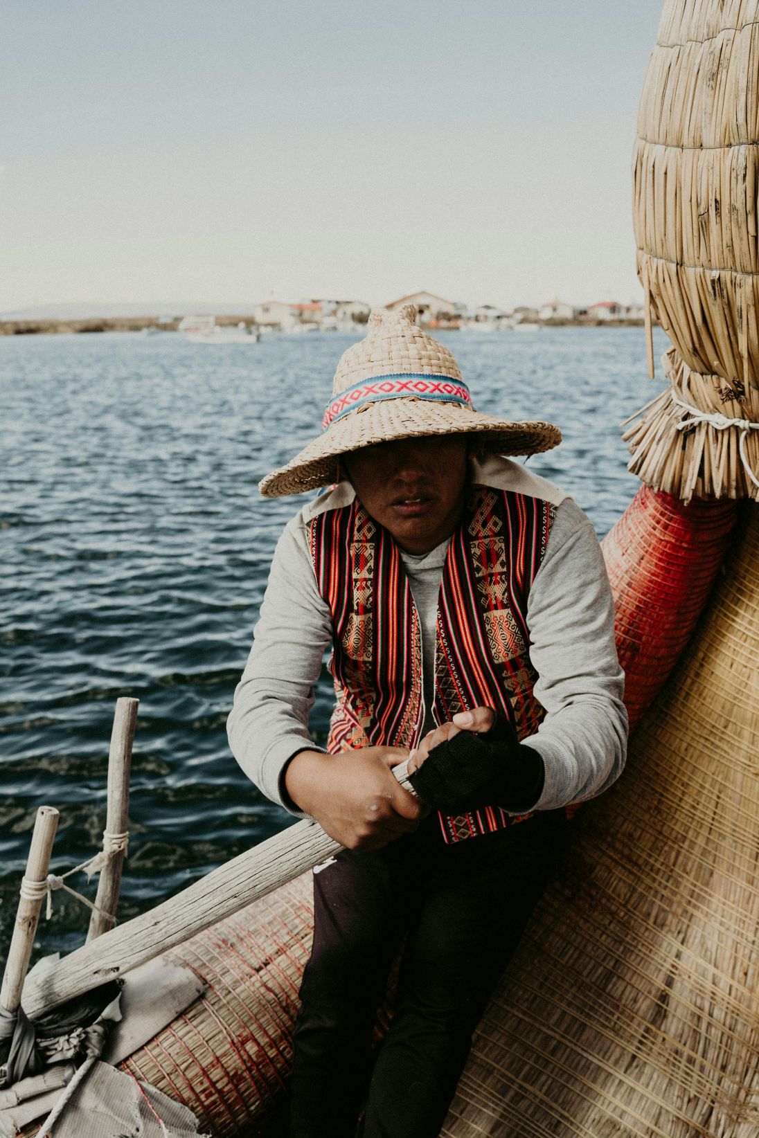 Local on a boat in Puno