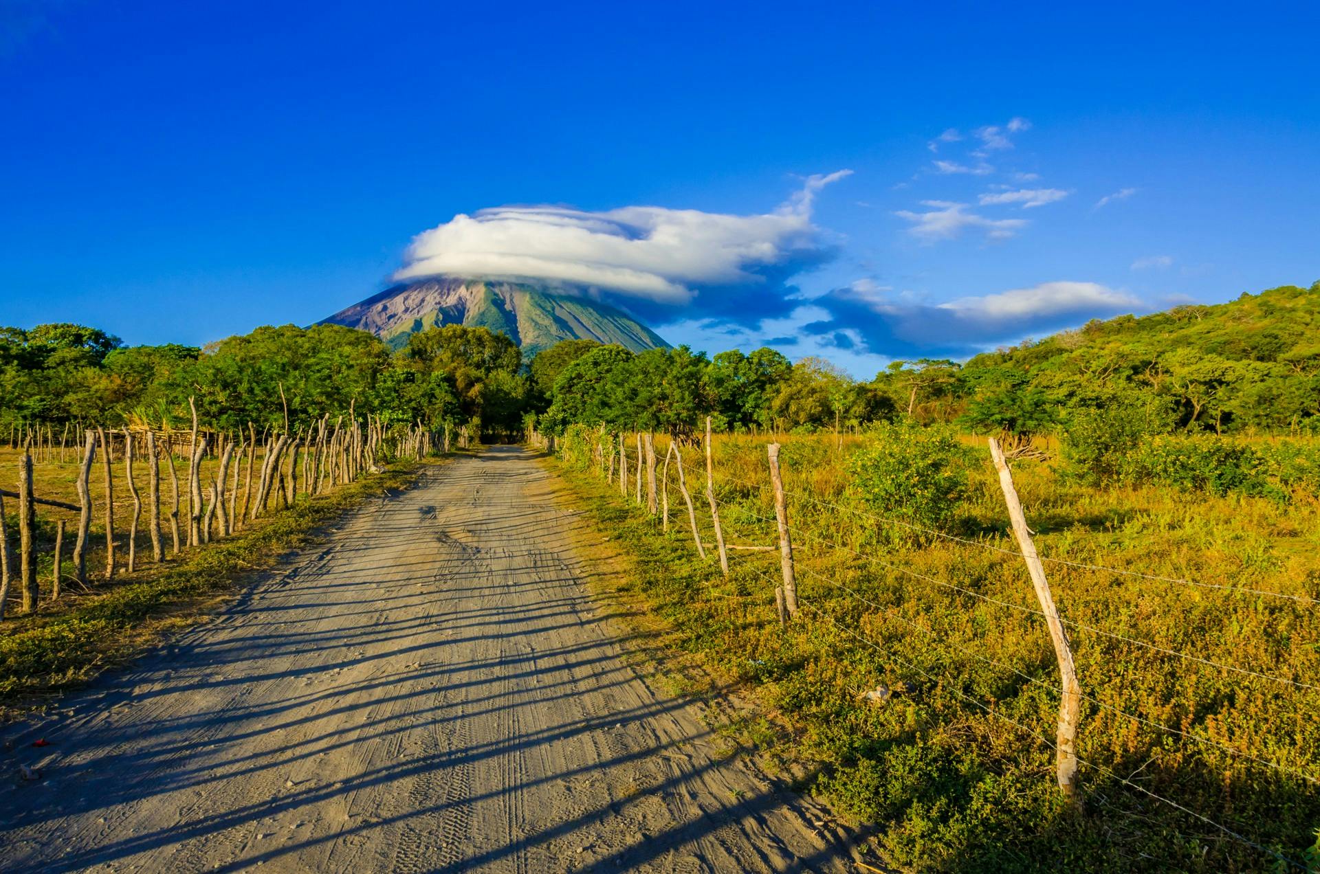 road leading to cloud topped volcano nicaragua