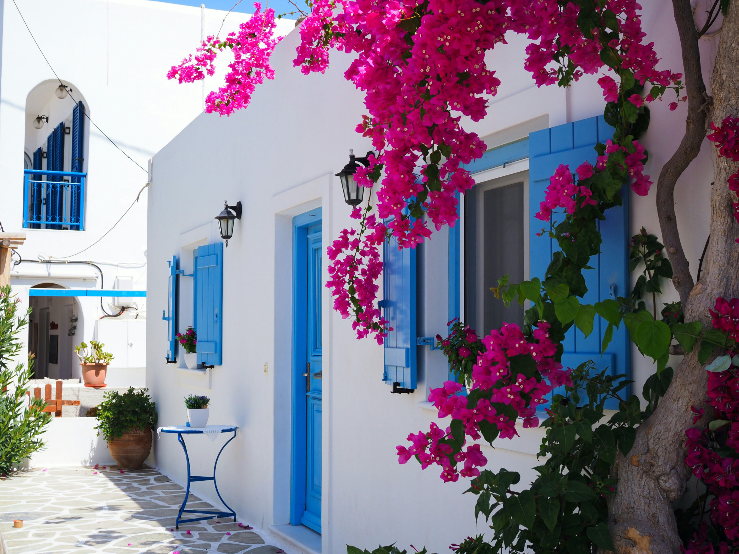 White buildings with blue domes in Santorini, Greece